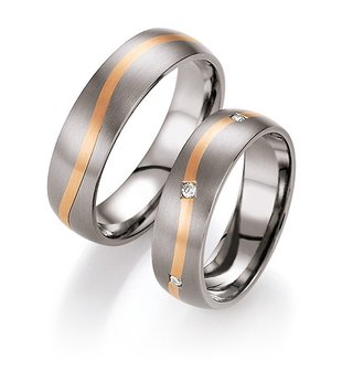 Trouwringen in titanium en roodgoud met diamant(en)per paar 