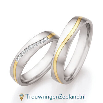 Trouwringen in edelstaal en 14 karaat geelgoud met diamant(en) per paar 