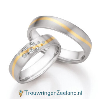 Trouwringen in edelstaal en 14 karaat geelgoud met diamant(en) per paar 