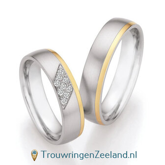 Trouwringen in edelstaal en 14 karaat geelgoud met diamant(en) per paar 