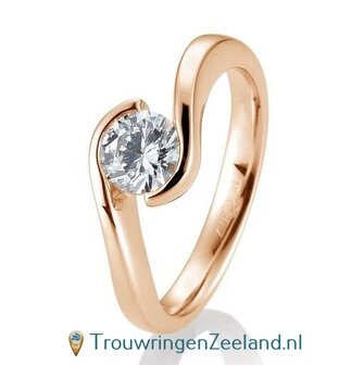 Verlovingsring ros&eacute;goud golvend met 0,80 ct diamant in 14 of 18 karaat  vanaf