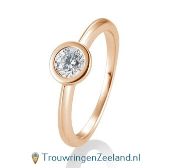 Verlovingsring ros&eacute;goud met ronde zetting en 0,50 ct diamant in 14 of 18 karaat 