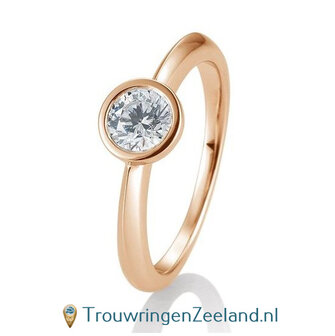 Verlovingsring ros&eacute;goud met ronde zetting en 0,60 ct diamant in 14 of 18 karaat 