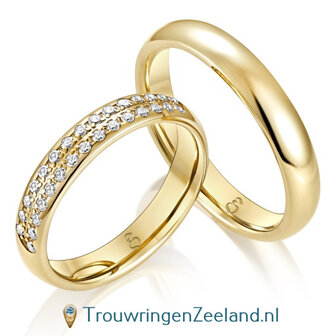 Trouwringen in 14 of 18 karaat geelgoud glans gepolijst met in de damesring 30 diamanten in 2 rijen geplaatst