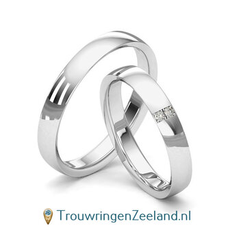 Trouwringen in 8*/14/18 karaat geelgoud glans gepolijst 3,5 mm. breed met in de damesring 2 x 0.015 ct diamanten overdwars gezet