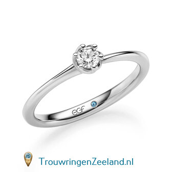 Verlovingsring in 14 of 18 karaat geelgoud met 1 x 0,20 ct topsteen diamant&nbsp;in een bijzondere gedraaide 6 punt zetting 