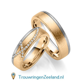 Trouwringen in 14 of 18 karaat witgoud ijsmat 6,0 mm. breedte met in de damesring 24 diamanten in 2 rijen overlappend gezet per paar 