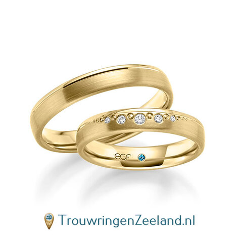 Trouwringen in 14 karaat witgoud mat en glans met in de damesring 5 diamanten oplopend in grootte