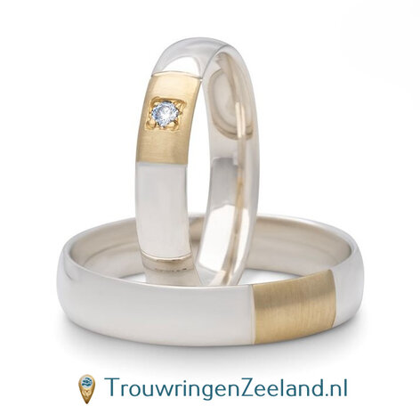 Trouwringen in argentium glans gepolijst en 14 karaat geelgoud mat met in de damesring 1 diamant vierkant gezet