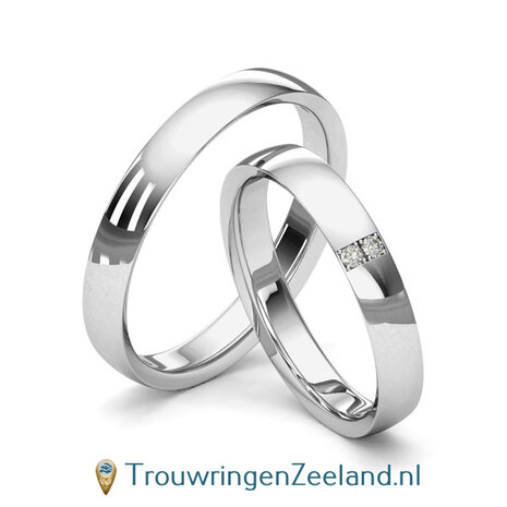 Trouwringen in 8*/14/18 karaat geelgoud glans gepolijst 3,5 mm. breed met in de damesring 2 x 0.015 ct diamanten overdwars gezet
