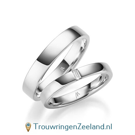 Trouwringen in 8*/14/18 karaat geelgoud glans gepolijst 2,5/3,5 mm. breed met in de damesring 1 x 0.05 ct baguette geslepen diamant