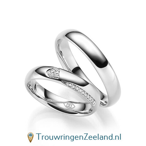 Trouwringen in 14/18 karaat roodgoud glans gepolijst met in de damesring 6 diamanten in een hart en 10 diamanten als randzetting 0,086 ct 