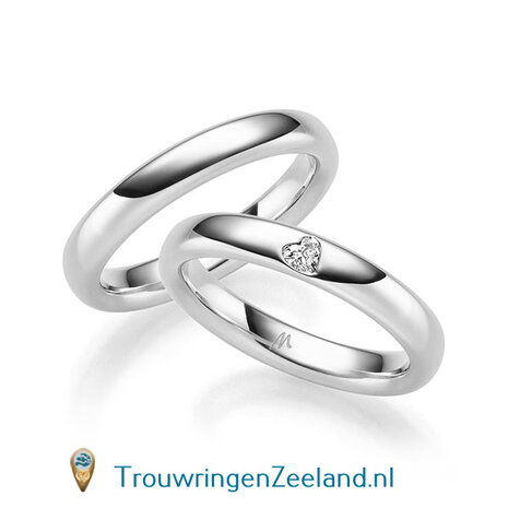 Trouwringen in 8*/14/18 karaat roodgoud glans gepolijst  3,50 mm. breed  en in de damesring 1 diamant in een hart gezet per paar vanaf