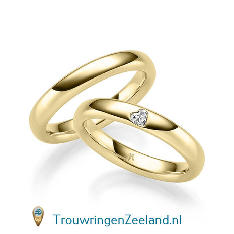 Trouwringen in 8*/14/18 karaat roodgoud glans gepolijst  3,50 mm. breed  en in de damesring 1 diamant in een hart gezet per paar vanaf