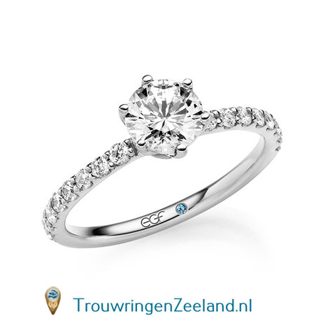 Verlovingsring in 14 of 18 karaat geelgoud met 1 x 1,00 ct diamant&nbsp;topsteen met 16 x 0,02 ct diamanten zijstenen en 3 diamanten aan weerszijden onderaan de kroon