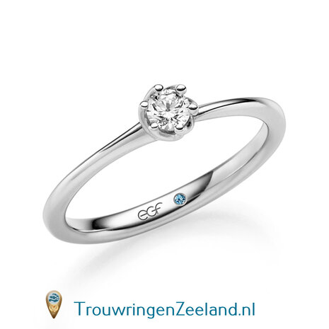 Verlovingsring in 14 of 18 karaat witgoud met 1 x 0,20 ct topsteen diamant&nbsp;in een bijzondere gedraaide 6 punt zetting 