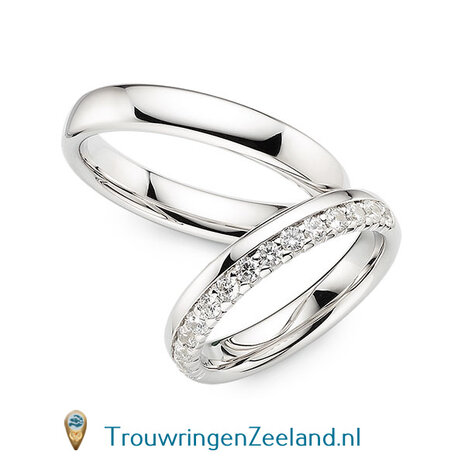 Trouwringen in 14 of 18 karaat geelgoud glans gepolijst 4,0 mm. breedte en in de damesring 15 diamanten in een kroon gezet per paar 