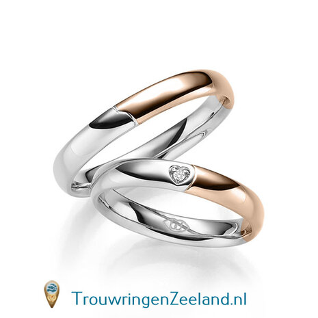 Trouwringen in 14 of 18 karaat witgoud glad gepolijst 4,0 mm. breedte met in de damesring 1 diamant in een hart gezet per paar 