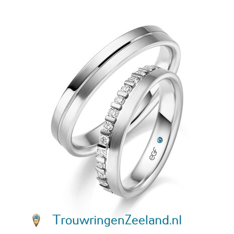 Trouwringen in 14 of 18 karaat geelgoud mat en glans gepolijst met een midden scheidingsvoeg en in de damesring 15 diamanten in een kroon gezet per paar