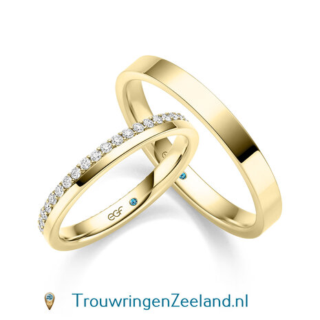 Trouwringen in 14 karaat geelgoud glans gepolijst en in de damesring 42 diamanten geheel rondom in een kroon gezet per paar
