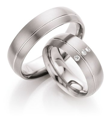 T%rouwringen in titanium met diamant(en) per paar