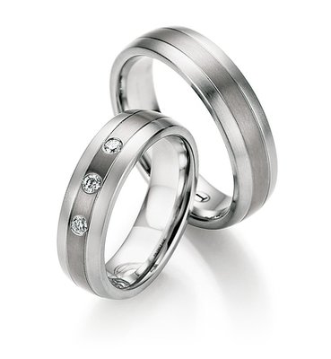 Trouwringen in titanium en edelstaal met diamant(en) per paar