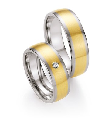 Trouwringen in edelstaal en geelgoud met diamant(en) per paar