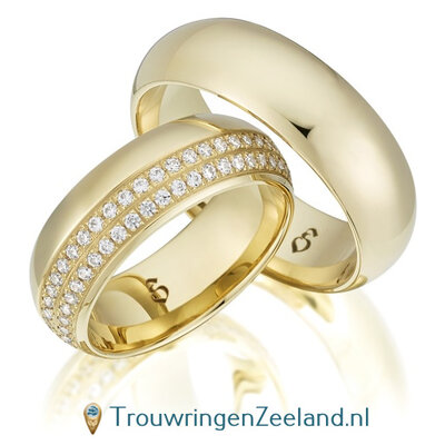 Trouwringen in 9*/14/18 karaat geelgoud glans met in de damesring 88 diamanten in een dubbele ring geheel rond per paar