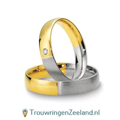 Trouwringen in 8*/14/18 karaat bicolour half geelgoud glans en half witgoud mat overdwars met in de damesring 1 diamant per paar