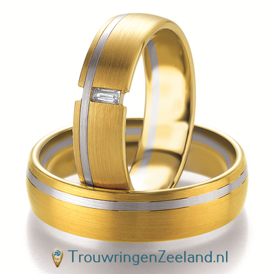 Trouwringen in 8*/14/18 karaat bicolour witgoud met geelgoud met in de damesring 1 diamant per paar