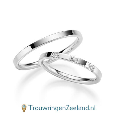 Trouwringen in 8*/14/18 karaat witgoud glans gepolijst 2,0 mm. breed met in de damesring 3 x 0,015 ct diamanten in 4 puntzetting