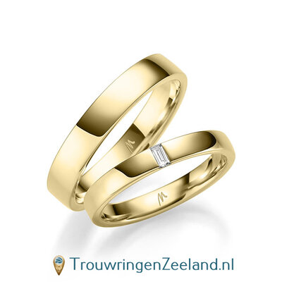 Trouwringen in 8*/14/18 karaat geelgoud glans gepolijst 2,5/3,5 mm. breed met in de damesring 1 x 0.05 ct baguette geslepen diamant