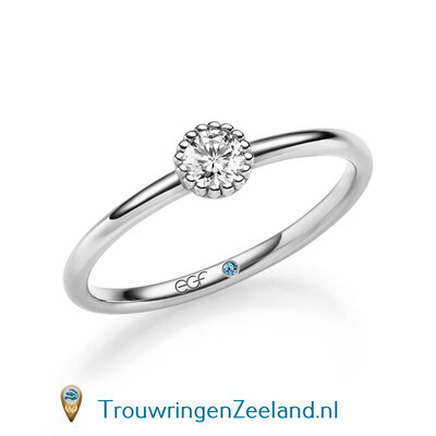 Verlovingsring in 14/18 karaat witgoud met 1 x 0,20 ct briljant geslepen diamant kwaliteit TW/SI in een ronde parelzetting
