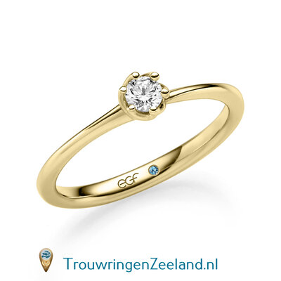 Verlovingsring in 14 of 18 karaat geelgoud met 1 x 0,20 ct topsteen diamant in een bijzondere gedraaide 6 punt zetting