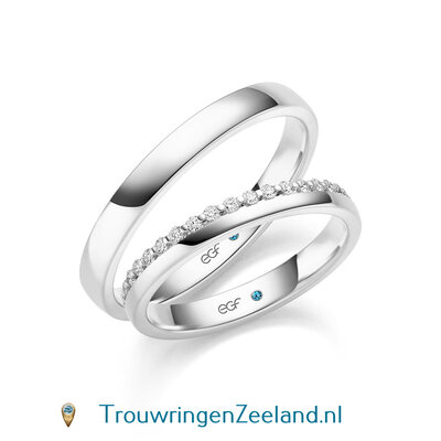 Trouwringen in 14 of 18 karaat witgoud glans gepolijst en in de damesring 18 diamanten halve ring in een kroon gezet per paar